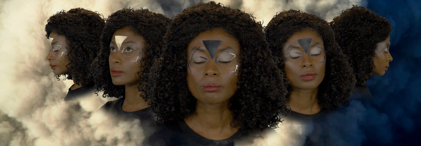 Five repetitions of a woman with dark skin tone, painted shapes on her forehead, and curly hair looking in different directions atop a cloudy background 