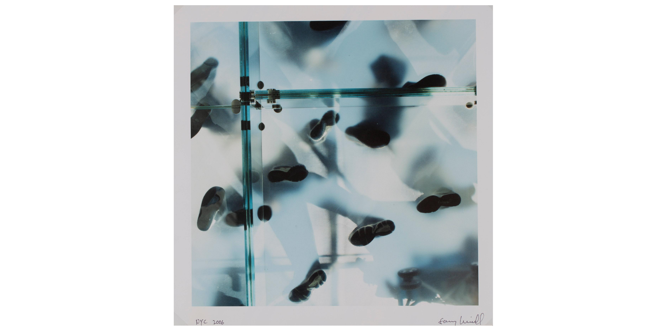 upward view of people standing on semi-translucent glass floor