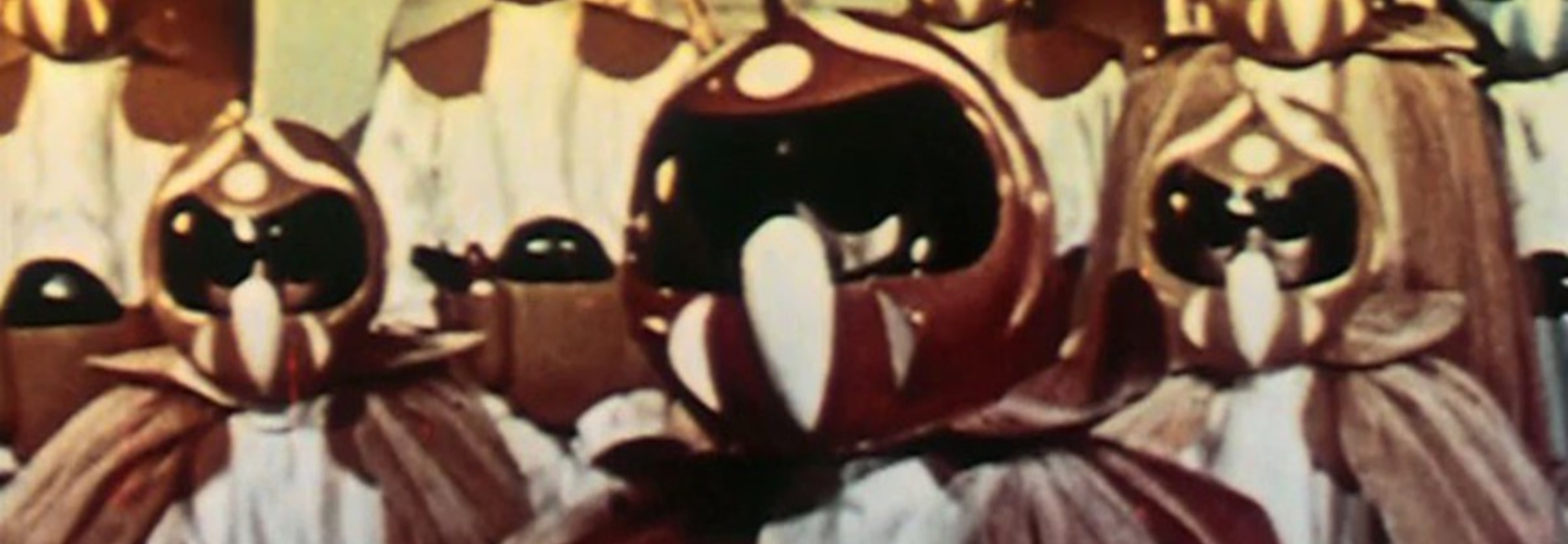 Vintage of aliens in reddish spacesuits