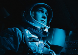 Blue light on Ryan Gosling in an astronaut suit