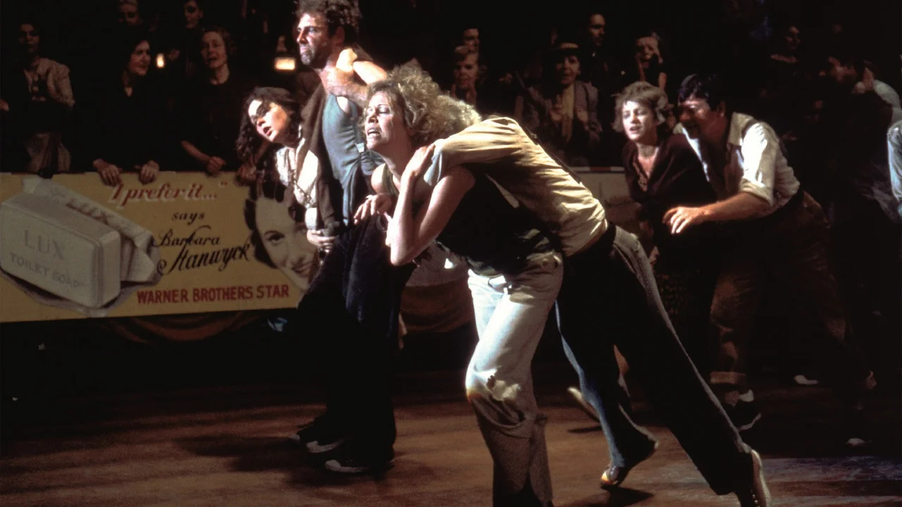 black and white image of man with light-skin color and white hair wearing denim jacket