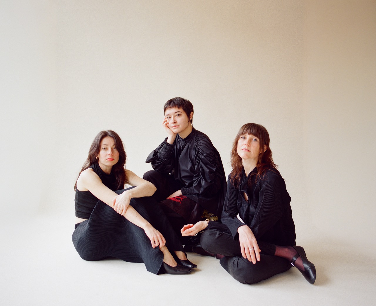 Portrait of Macie Stewart, Whitney Johnson, and Lia Kohl