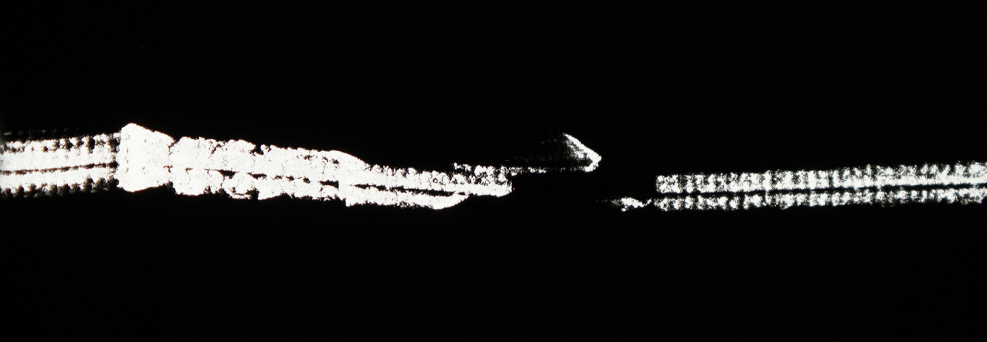 A horizontal channel of light crosses a black background