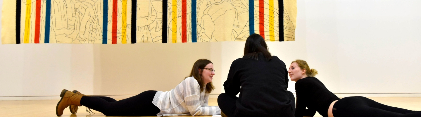 students hanging in gallery